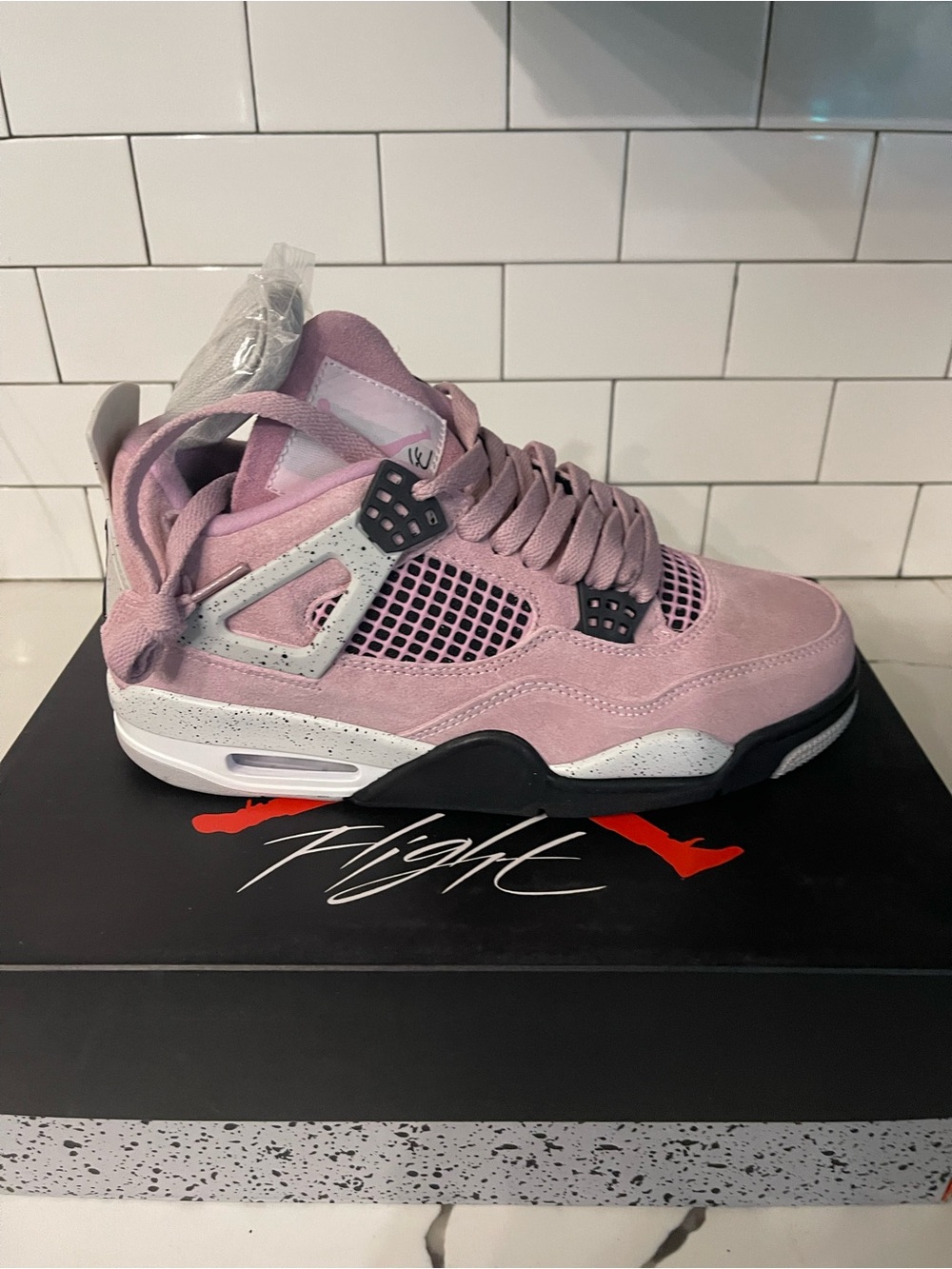 Men’s Retro 4 Pink Orchid Size 7.5.